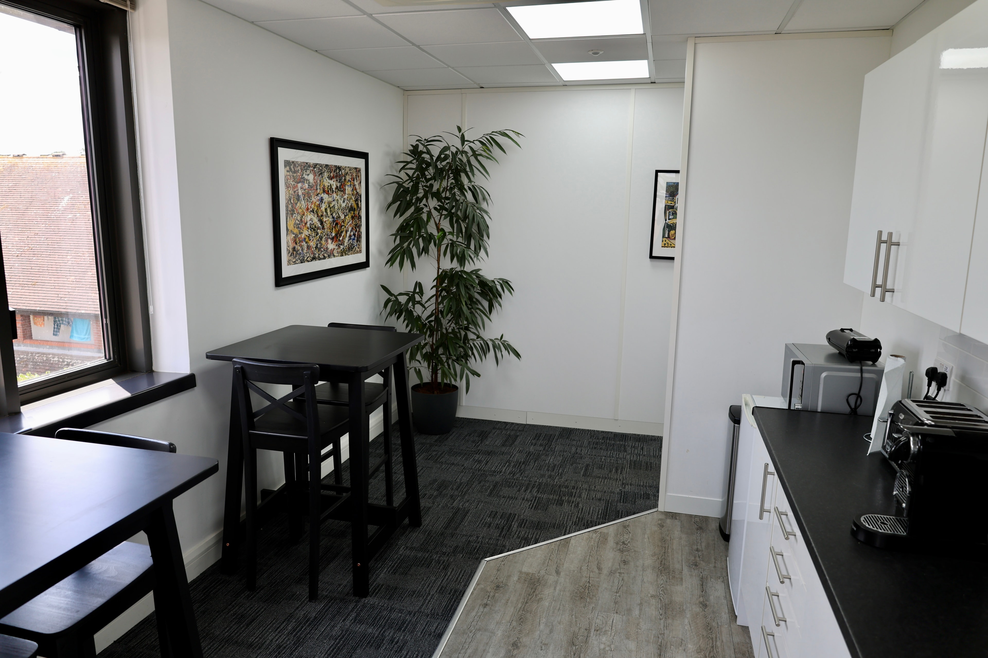 Bright breakout lounge area with comfortable seating